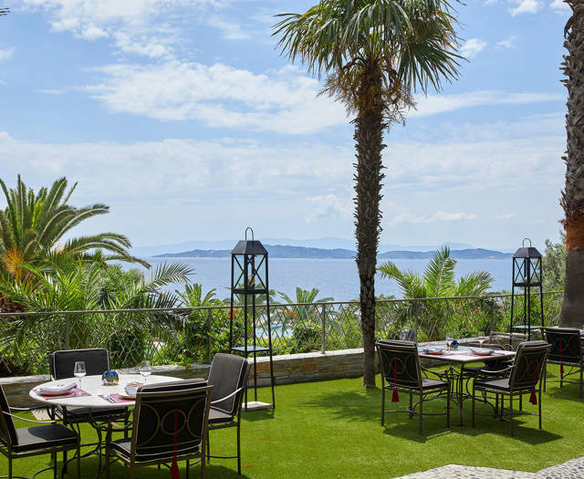Eagles Resort Chalkidiki Vinum Restaurant outdoor table seats with sea views